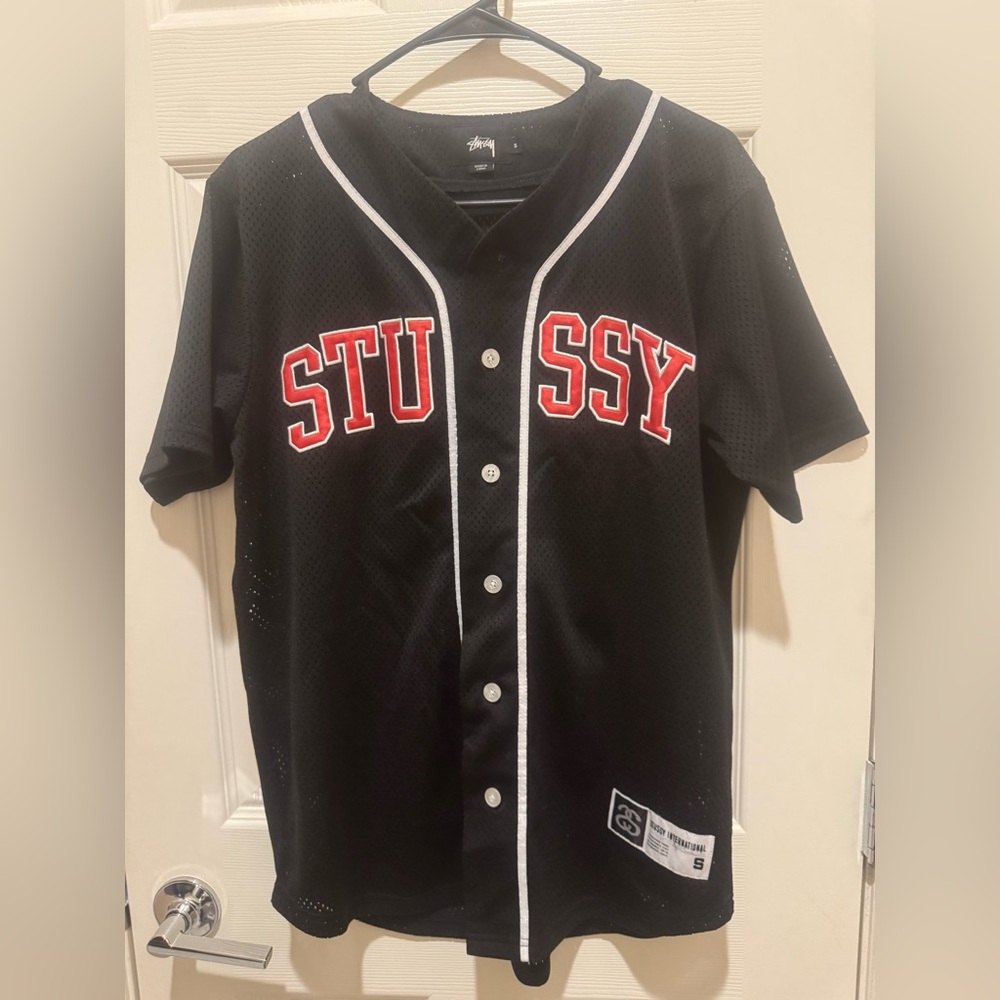 STUSSY Men’s Small Mesh Jersey Black With Red Letters And White Accents